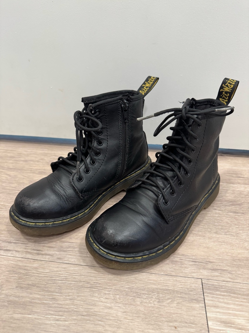Dr. Martens Black Leather Lace-Up Combat Boots with Yellow Stitching
